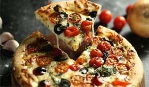 TradeVille: Domino's Pizza - vânzări peste aşteptări, în SUA